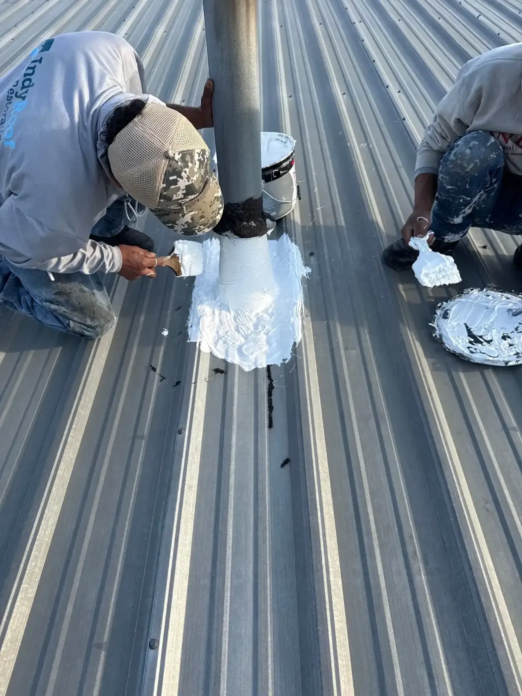 Tarping and dry-in on a Nora commercial roof